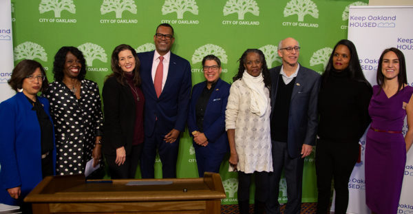 Mayor Libby Schaaf, Fred Blackwell, a Keep Oakland Housed client and representatives from the partner organizations of the KOH program at the one-year anniversary press conference.