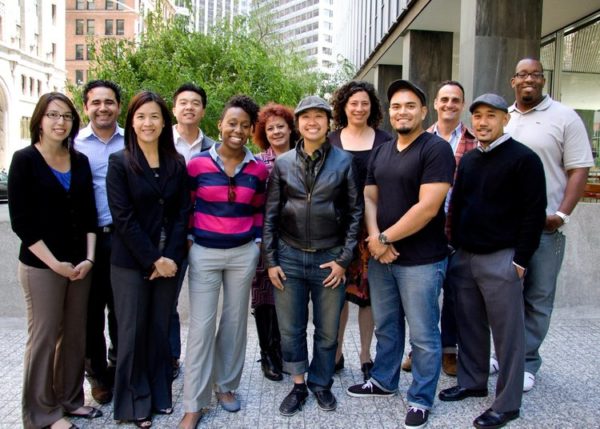 The Koshland Excelsior Fellows are the founding members of Excelsior Works! Photographed Front Row Left to Right: Nicole Agbayani, Joni Tam Chu, Tiffani Johnson, Rachel Ebora, Rene Luna, Terry Valen. Back Row Left to Right: Paulo Acosta Cabezas, Alex Tom, Jacquie Chavez, Beth Rubenstein, Charlie Sciammas, Carlton Eichelberger.